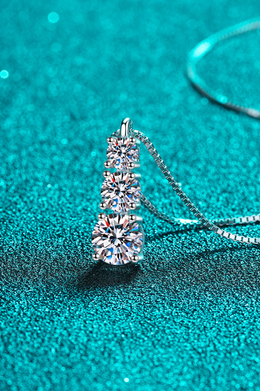 Triple pendant necklace side view